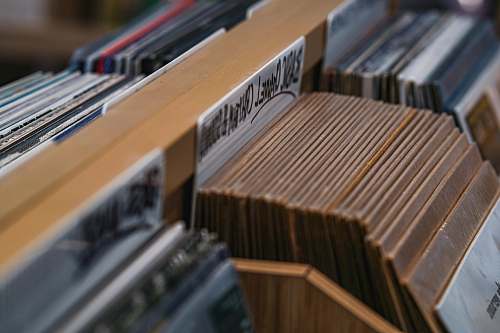 united arab emirates selective focus photography of album cases music
